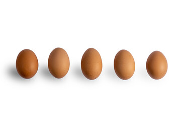 Brown chicken eggs on isolated white background