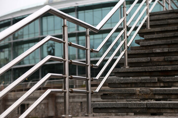 The metal railings and steps