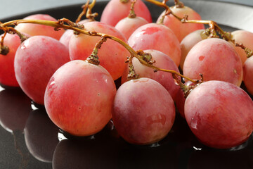fresh grapes in the plate