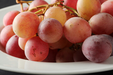 fresh grapes in the plate