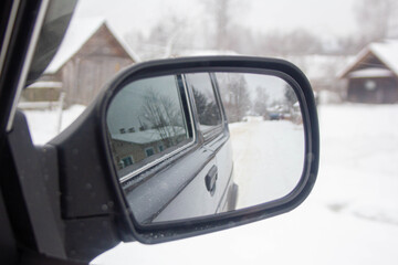 Russia, Demyansk village, 23.12.2020 car Niva 2121, Russian car, all-terrain vehicle side mirror, reflection