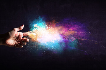 Obraz na płótnie Canvas Explosion of colored powder . Mixed media