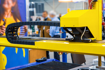 Plastic cable chain of electrical wires in the machine