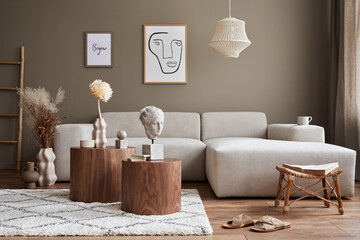 Interior design of stylish living room with modern neutral sofa, mock up poster farmes, dried...