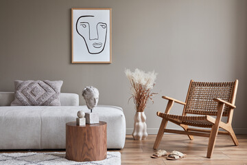 Modern concept of living room interior with design modular sofa, rattan armchair, dried flowers in...
