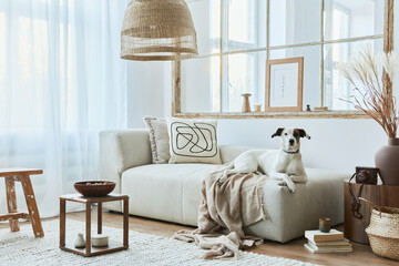 Stylish interior of living room with design modular sofa, furniture, coffee table, rattan...