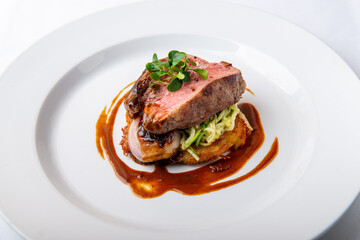 Beef steak with glazed shallots and zucchini spaghetti