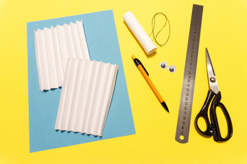 How to make a paper rabbit for Easter greetings. DIY children's art project. DIY concept. Step 3. Fold the paper into an accordion