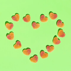 Jelly heart shaped candies, sweets, creative background