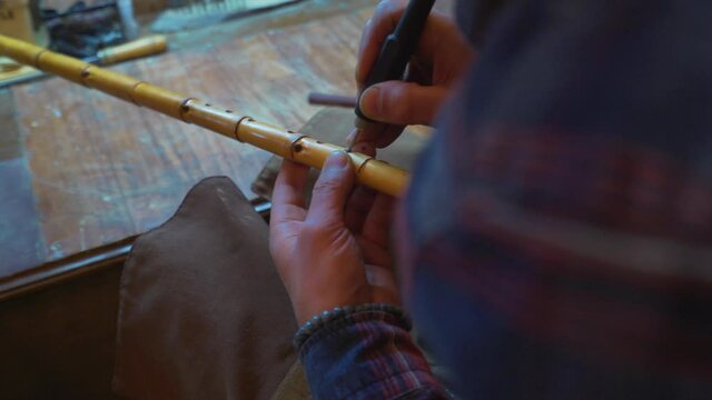 A master is making Ney instrument. 4K Footage in Turkey