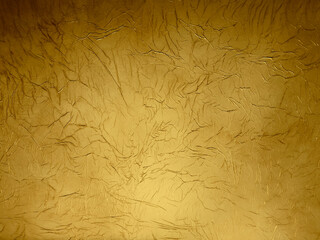 Crumpled, gold background.