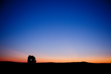 Fototapeta premium Four Wheel Drive silhouette in the desert.
