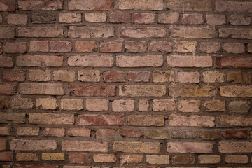 Old aged yellow orange red brick wall background texture