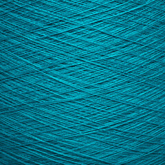 Thread yarn coil green blue macro