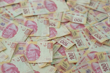 Fototapeta na wymiar Mexican bank notes of 100 pesos