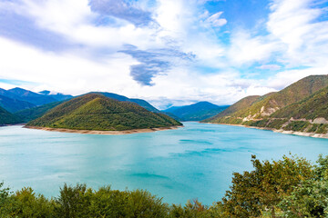 Naklejka na ściany i meble mountains and lake, dam in the mountains. Zhinvali water reservoir. Zhinvali dam.