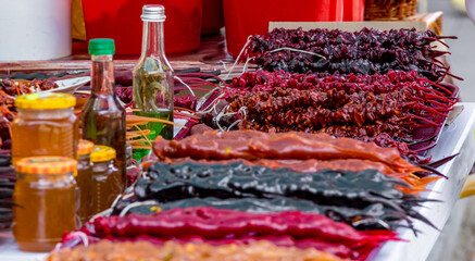 Delicious georgian sweetness Churchchel on the marketplace. Oriental sweets in the bazaar