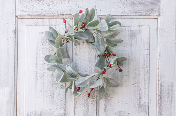 Lamb's Ear with red berries wreath on white antique door