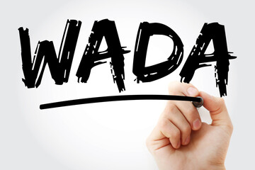 WADA - World Anti Doping Agency acronym with marker, concept background