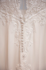 Close up detail shot of the back of a beautiful wedding dress