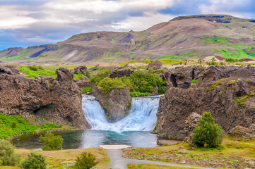 Hjalparfoss is a small waterfall near famous Hekla volcano