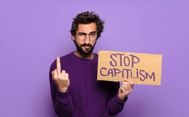 young bearded man stop capitalism concept