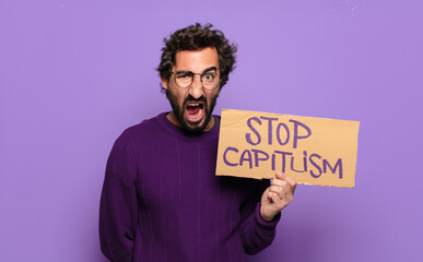 young bearded man stop capitalism concept