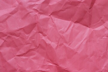 Fototapeta premium Crumpled red paper textre background