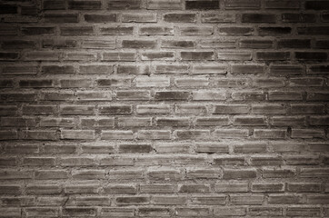 Old black brick wall texture background 
