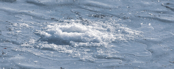 Ice hole for fishing in winter. Background