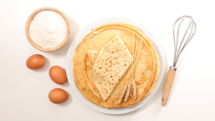 stack of crepe with ingredient on white background