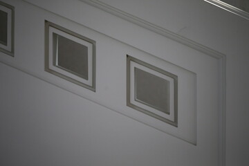 white wall with a window