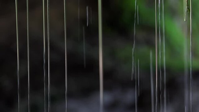 Streams of pouring down water.  