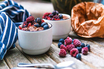 cacao chia pudding breakfast with berries