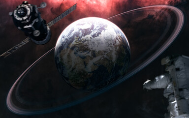 Obraz na płótnie Canvas Planet Earth with rings. Astronaut out of focus. Space station blurred in motion. Solar system. 3D Render. Science fiction. Elements of this image furnished by NASA