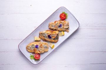 Traditional spanish Tapa Stuffed boquerones from south of Spain.