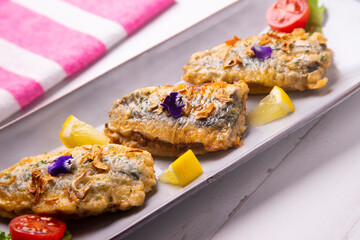 Traditional spanish Tapa Stuffed boquerones from south of Spain.