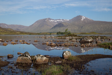 Reflecting landscape on Glen Coe in Scotland