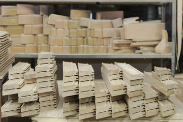 semi-finished products made of oak wood are prepared for assembling furniture in a joiner's shop