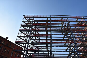 building under construction with a blue sky background. Taken in Manchester England. 
