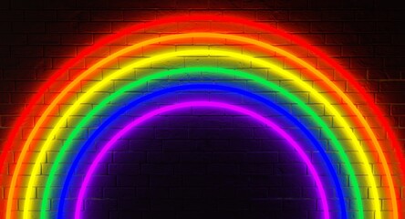 Neon rainbow lamps on a brick wall. Neon rainbow sign. Template neon sign. Rainbow colors of lights tubes. Human rights and tolerance. LGBT. Pride. Neon and brick wall background. 3d illustration.