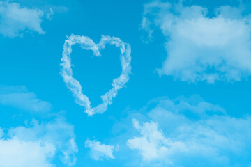 Love is in the air,  with clouds and blue background.