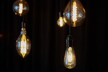 vintage electric lamp on black background