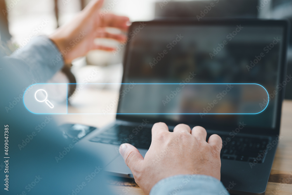 Fototapete Data Search Technology Search Engine Optimization. man's hands are using a computer notebook to Searching for information. Using Search Console with your website.