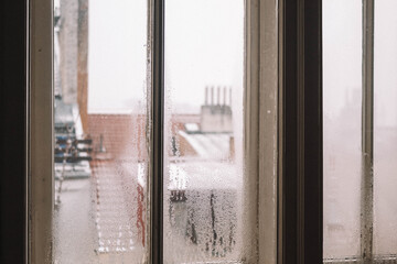 foggy window at home in the winter