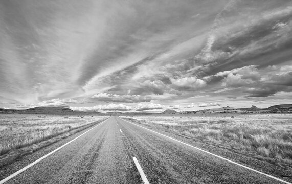 Black and white picture of scenic road in Canyonlands National Park, Utah, USA. © MaciejBledowski