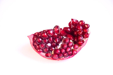 Pomegranate fruit isolated on white background. Healthy food
pomegranate slices. Red juicy chunk of...