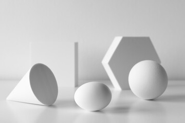 mid century moder composition of geometric shapes with egg