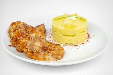 fried chicken with mustard and honey sauce with mashed potato on white background