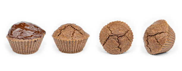 Homemade chocolate brown muffins isolated on white background